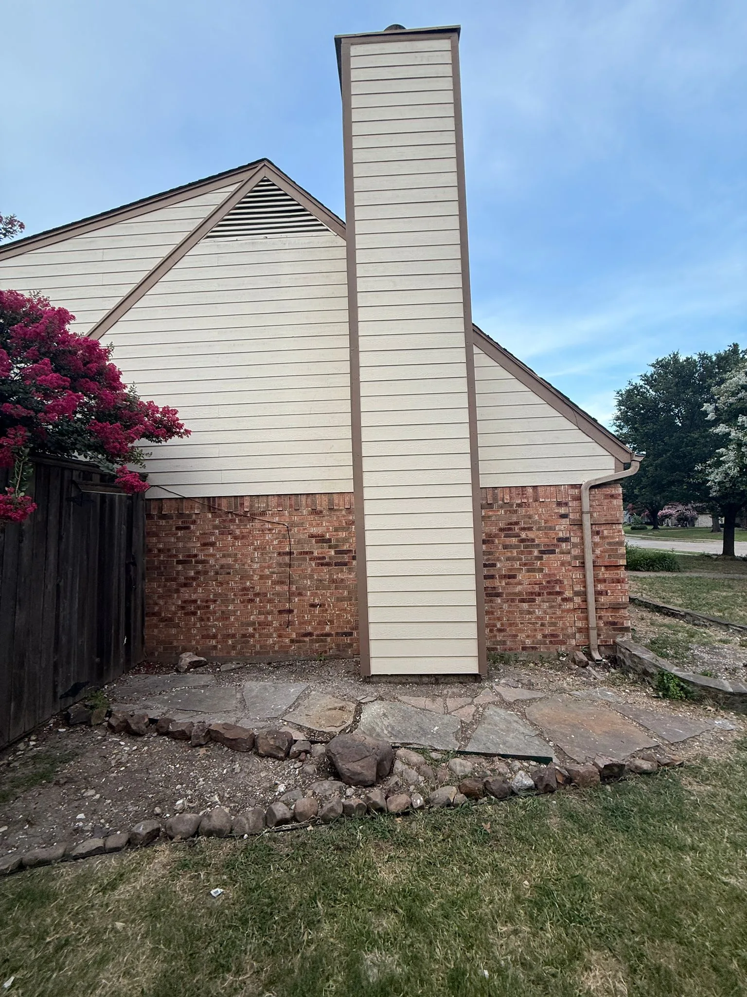 Stone-Veneer Chase Rebuilt and Re-Sided